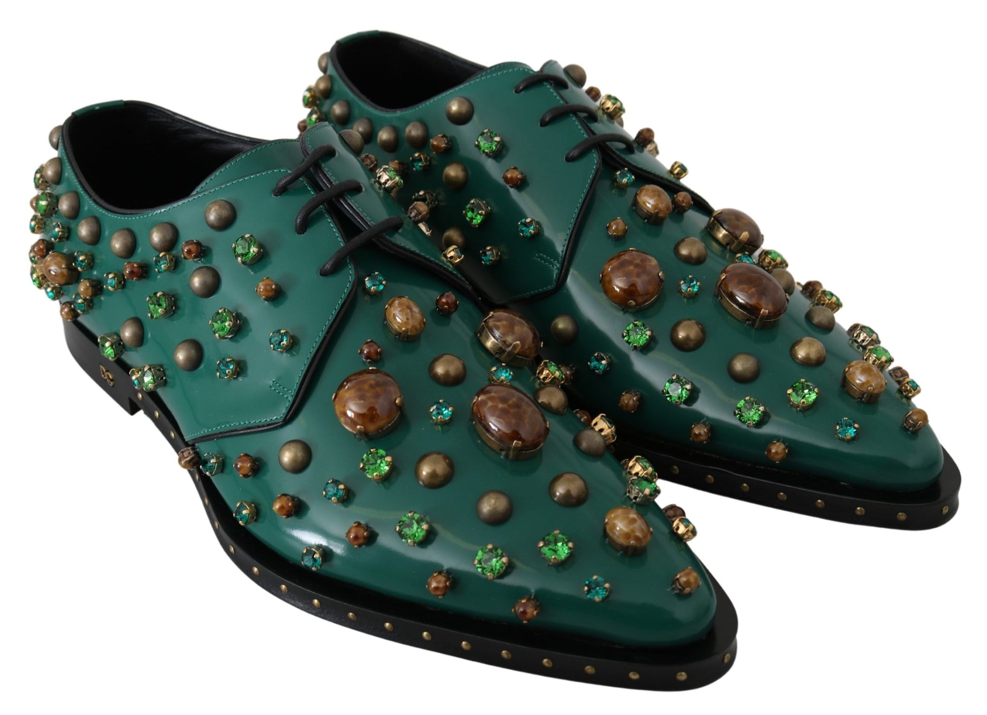 Green shoes with brown and green stones on top