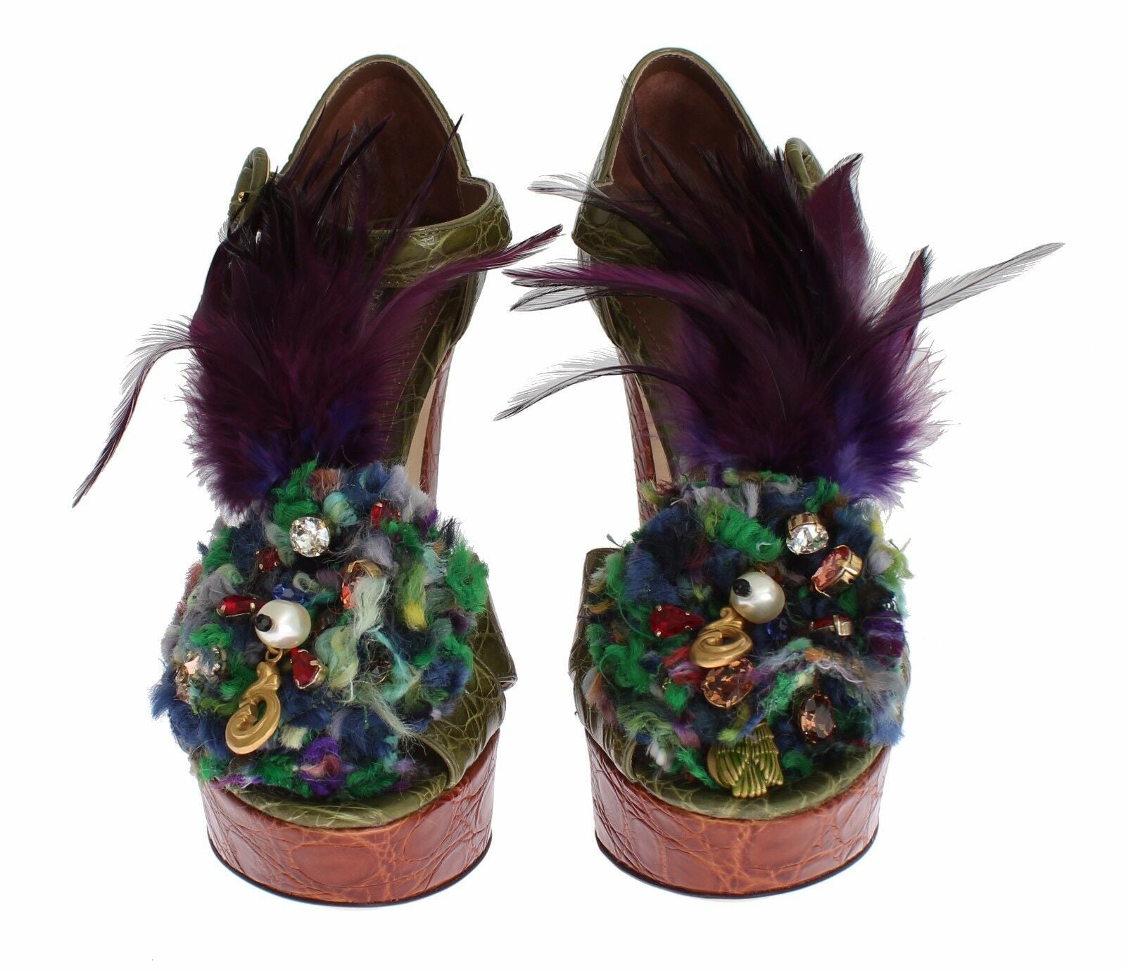 Pair of shoes with embellishments including feathers and beads