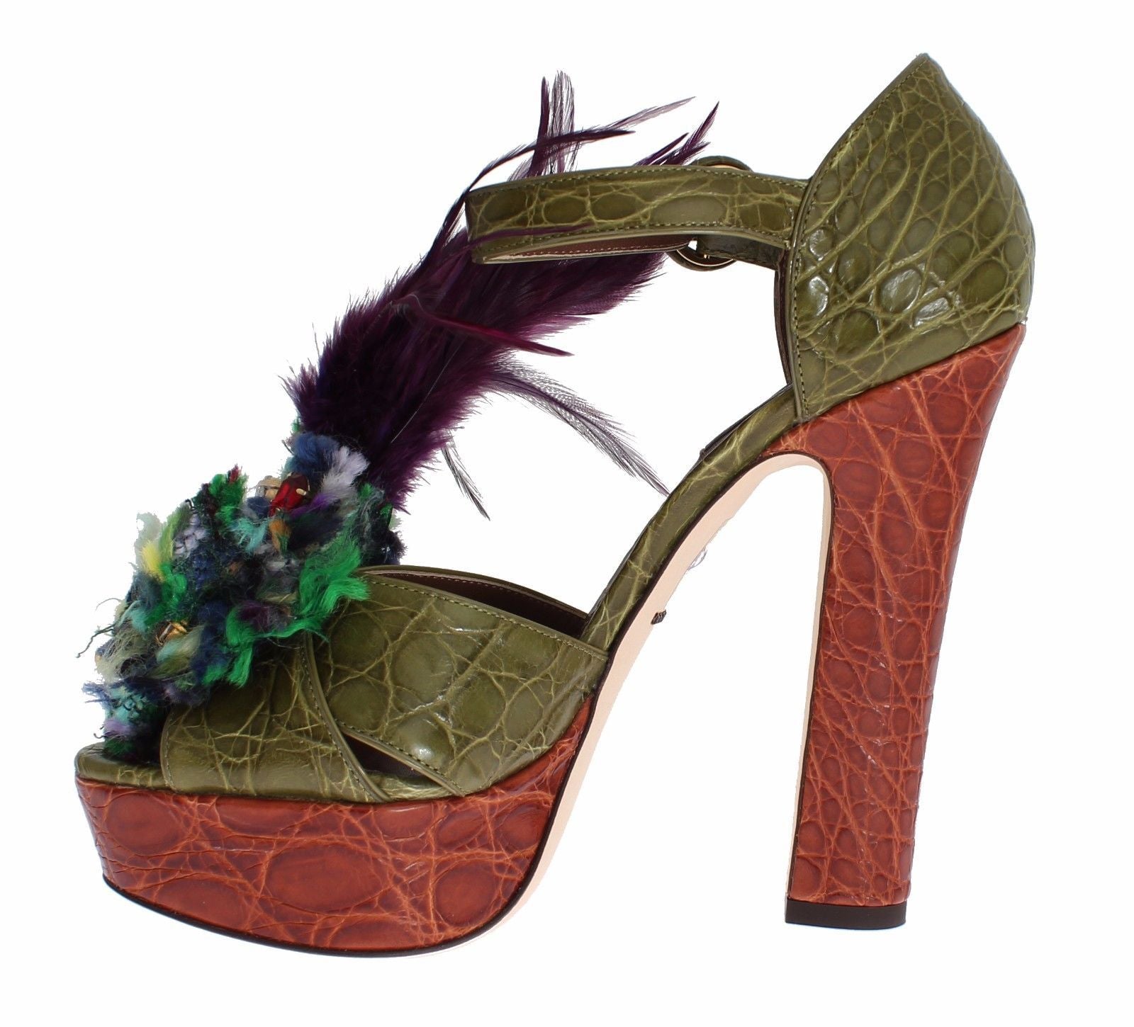 High heel shoe with a crocodile skin texture and a feather embellishment on top of the foot