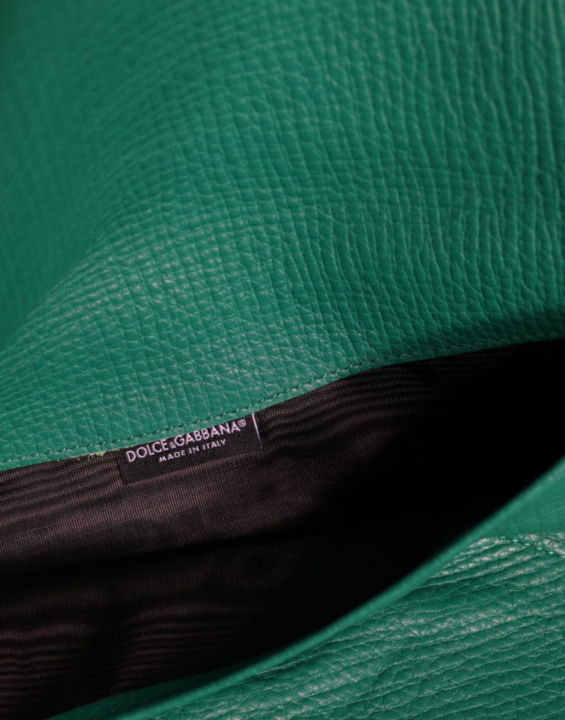 Green leather material with a label on it