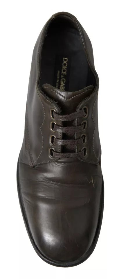Brown leather men's dress shoes with laces, branded label on tongue and sole