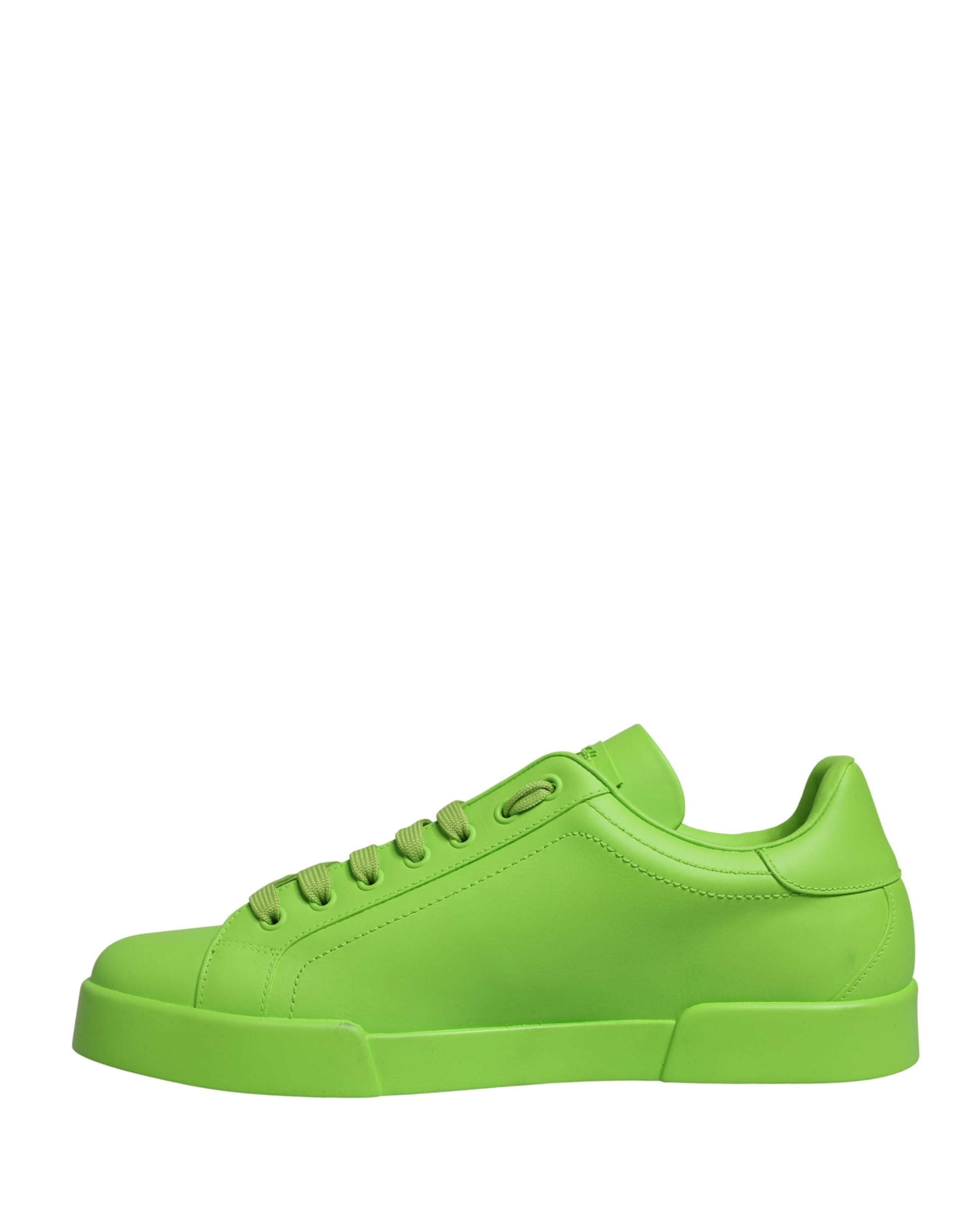 A pair of green leather sneakers with a low top, featuring a lace-up design and a chunky sole