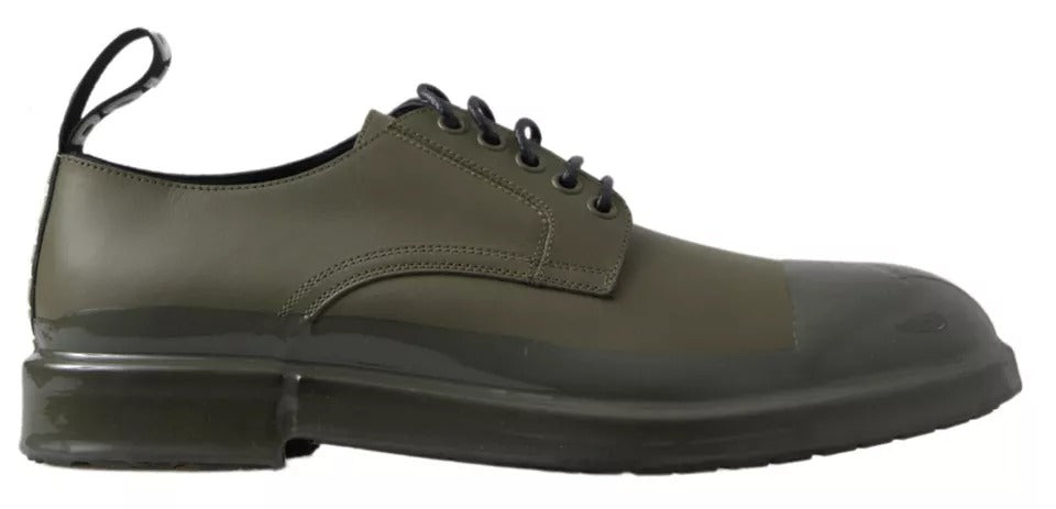 Pair of green leather dress shoes with rubber soles, laces and a small heel