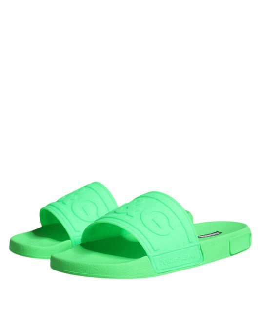 Bright green flip flops on white background
