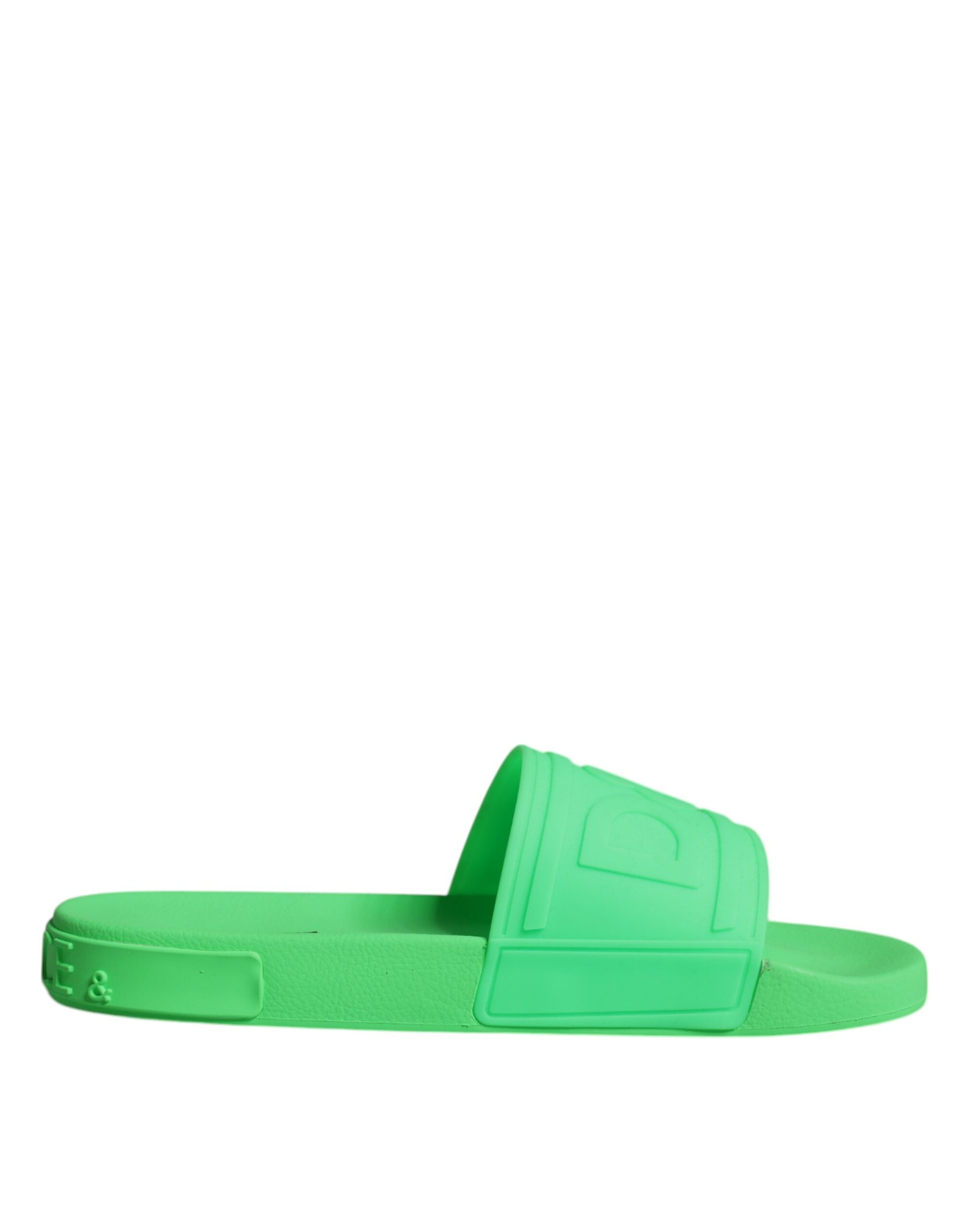 Green flip flops on white background