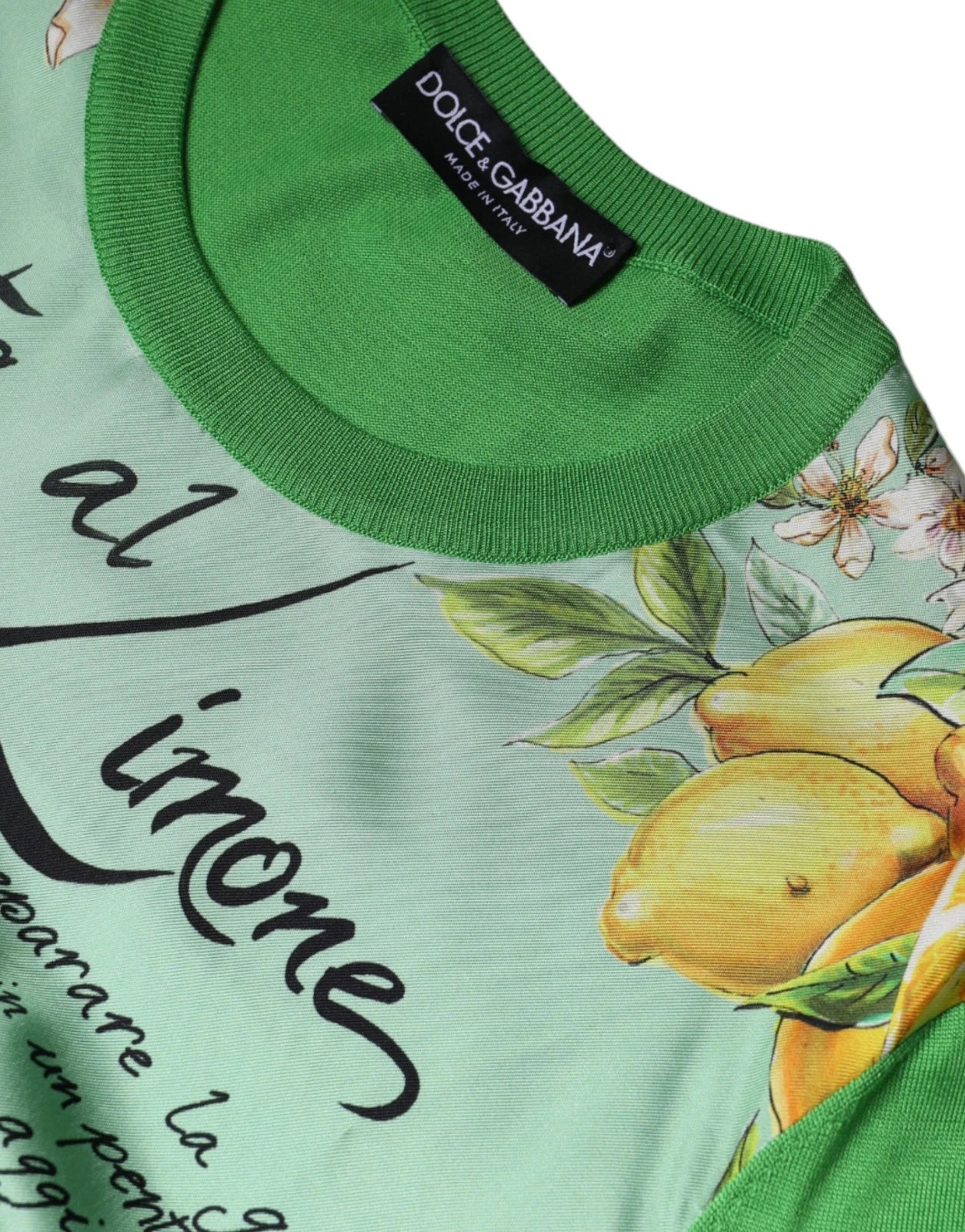 Green shirt with yellow lemons on front