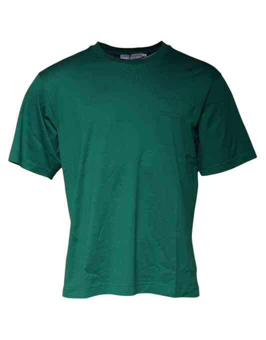 Green short sleeved shirt on hanger