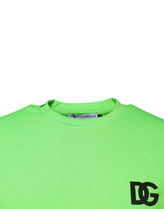 Green short sleeve shirt on hanger