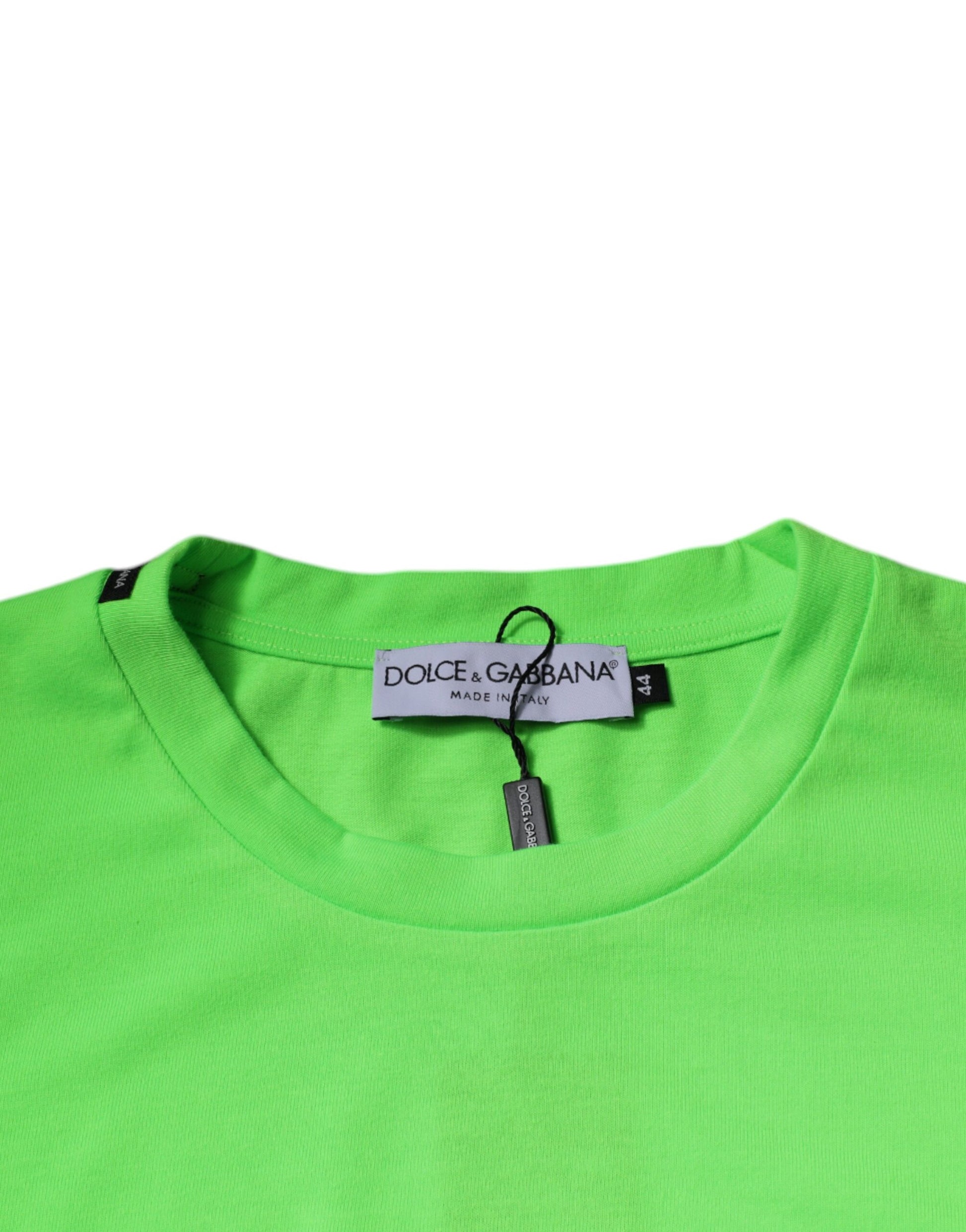Green t-shirt with black tag on neck