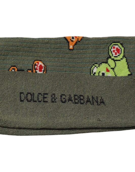 Green sock with cartoon dinosaurs on it