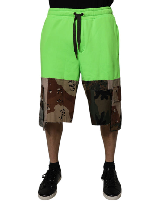 A pair of green patchwork cargo shorts with a drawstring waistband, designed by Dolce & Gabbana