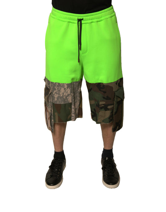 A pair of green cargo shorts with patchwork design, featuring a drawstring waistband and side pockets