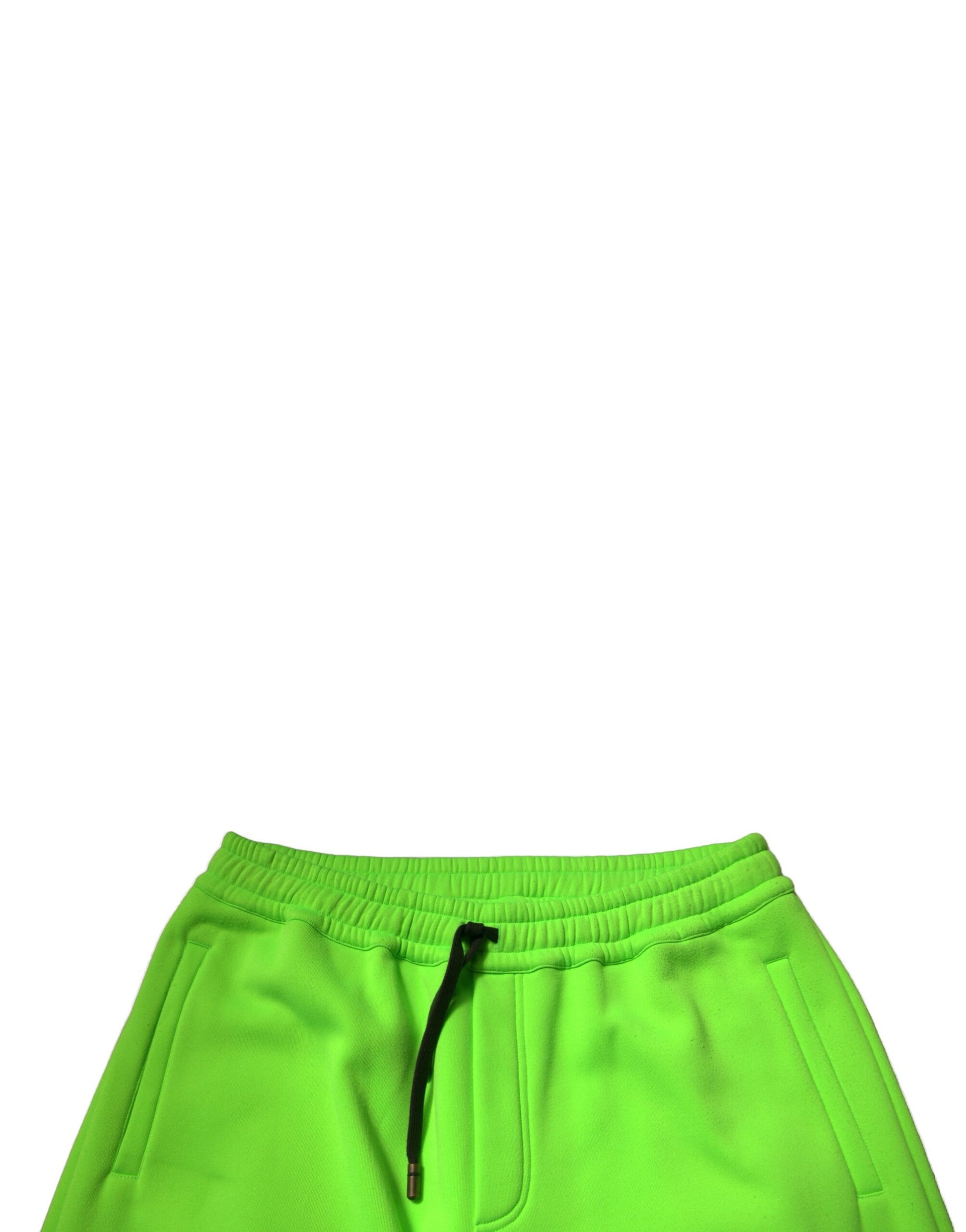 A pair of green cargo shorts with a drawstring waist and patchwork design