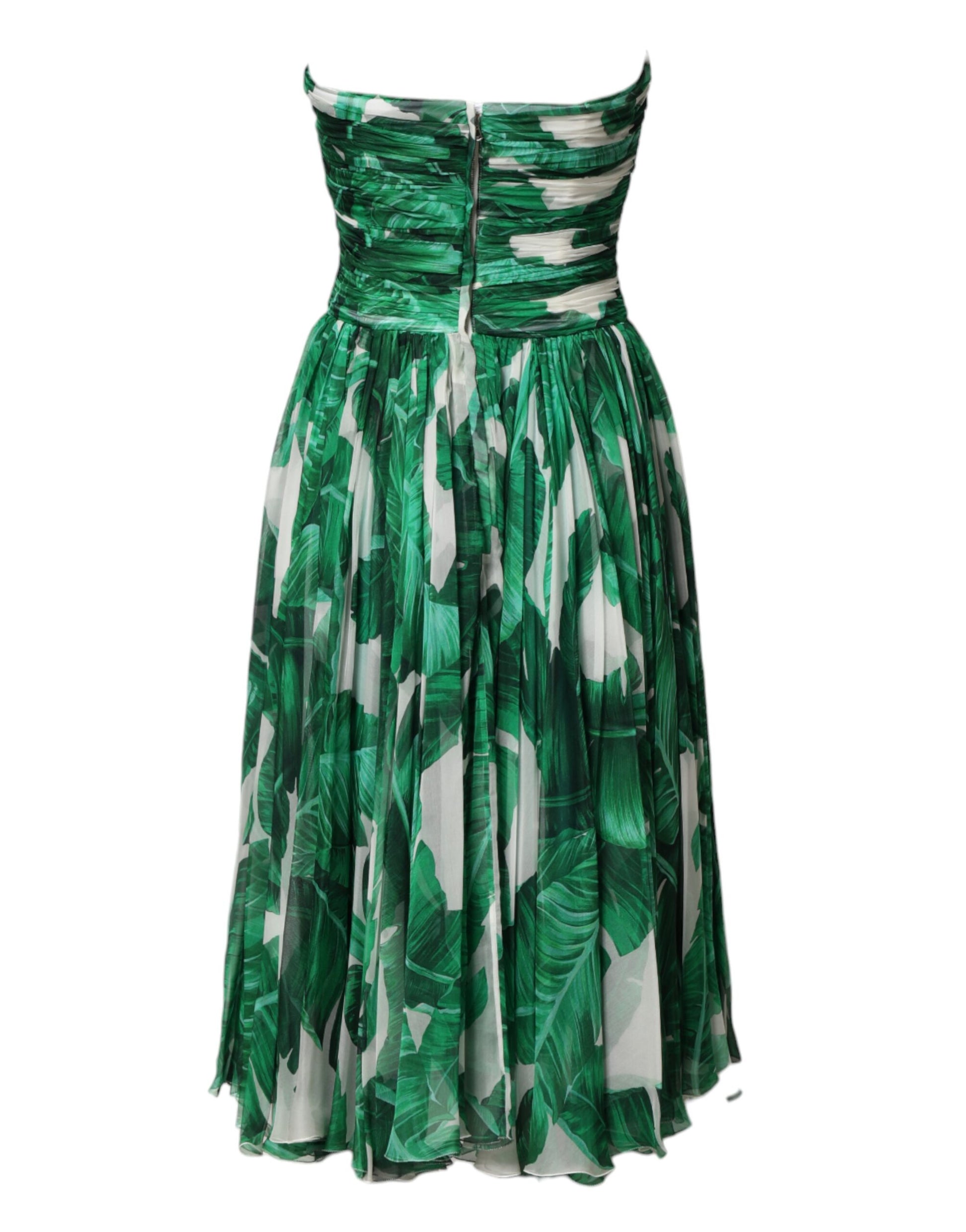 A green pineapple embellished dress with a banana leaf pattern and ruffled skirt