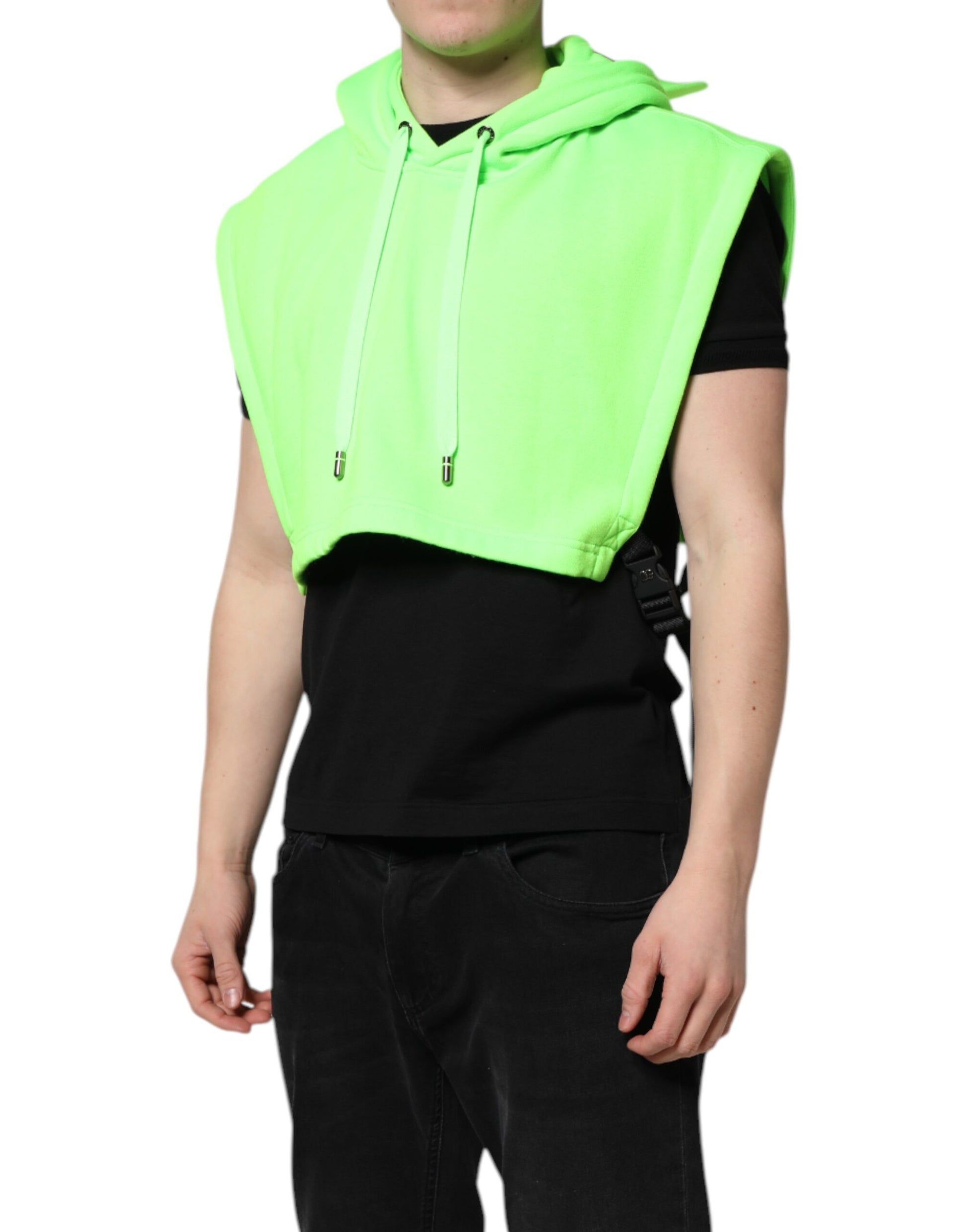 Bright neon green vest over black shirt
