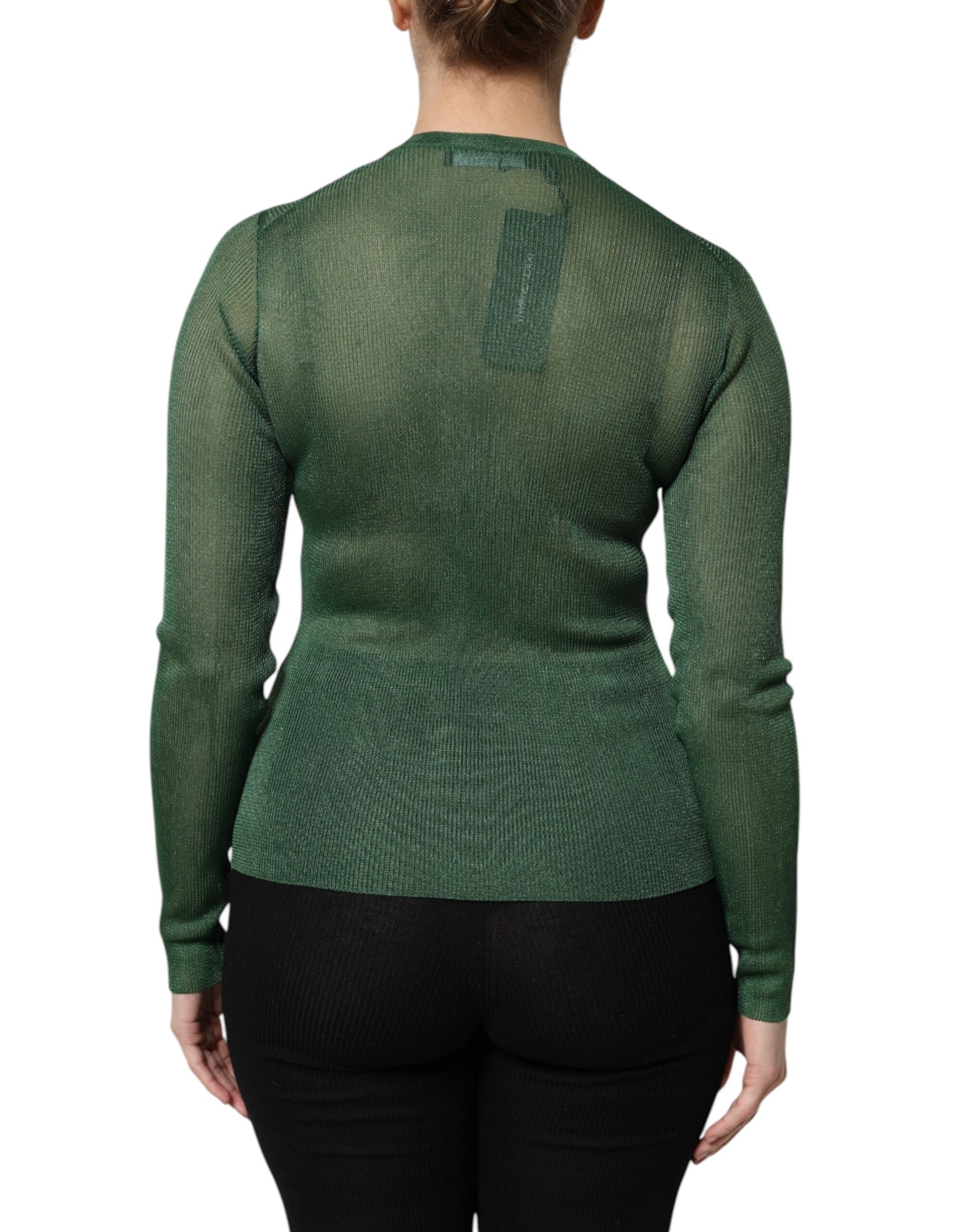 Green long sleeve top on a mannequin