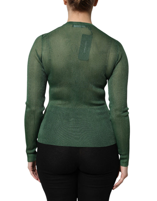 Green long sleeve top on a mannequin