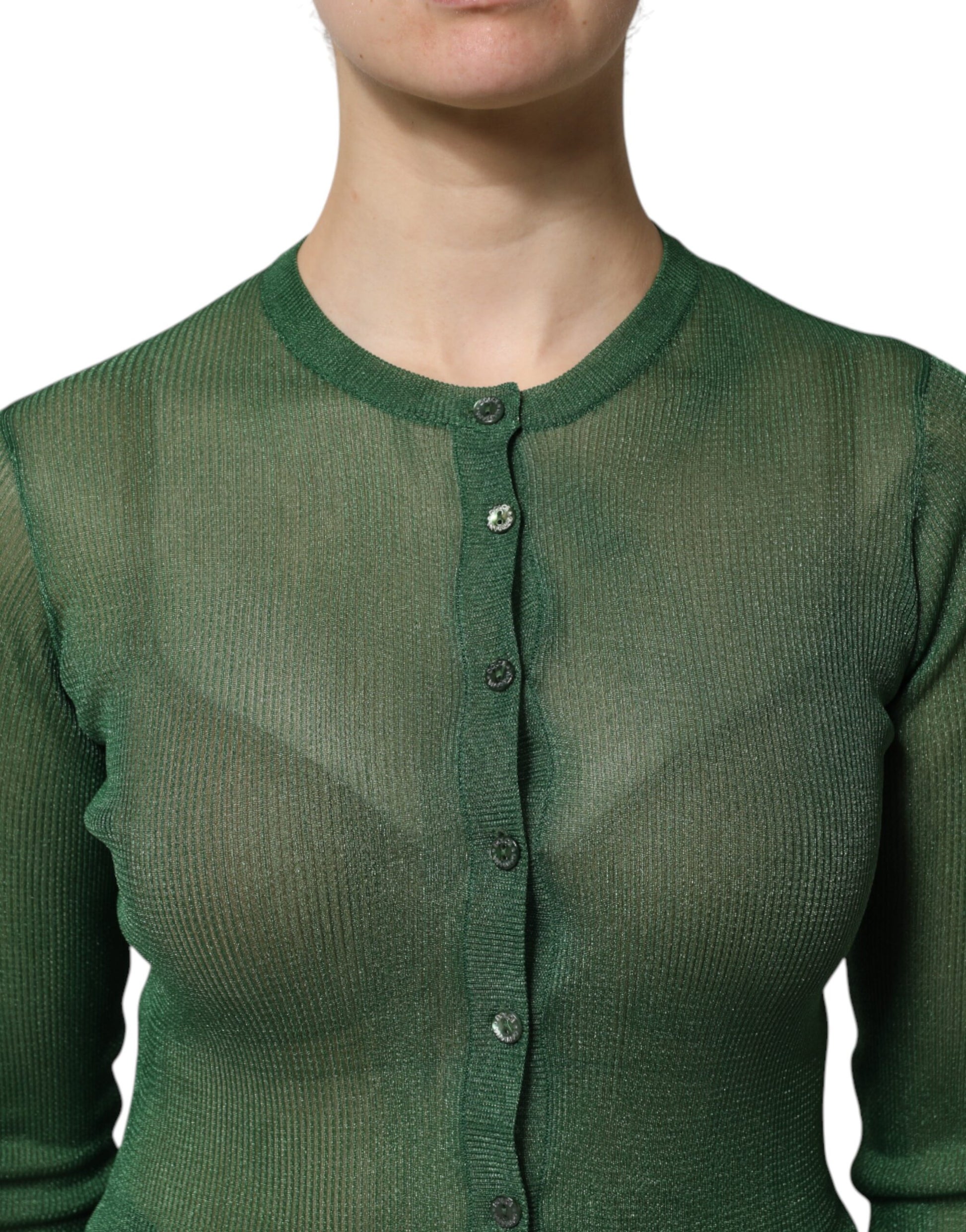 Woman wearing green sweater with buttons