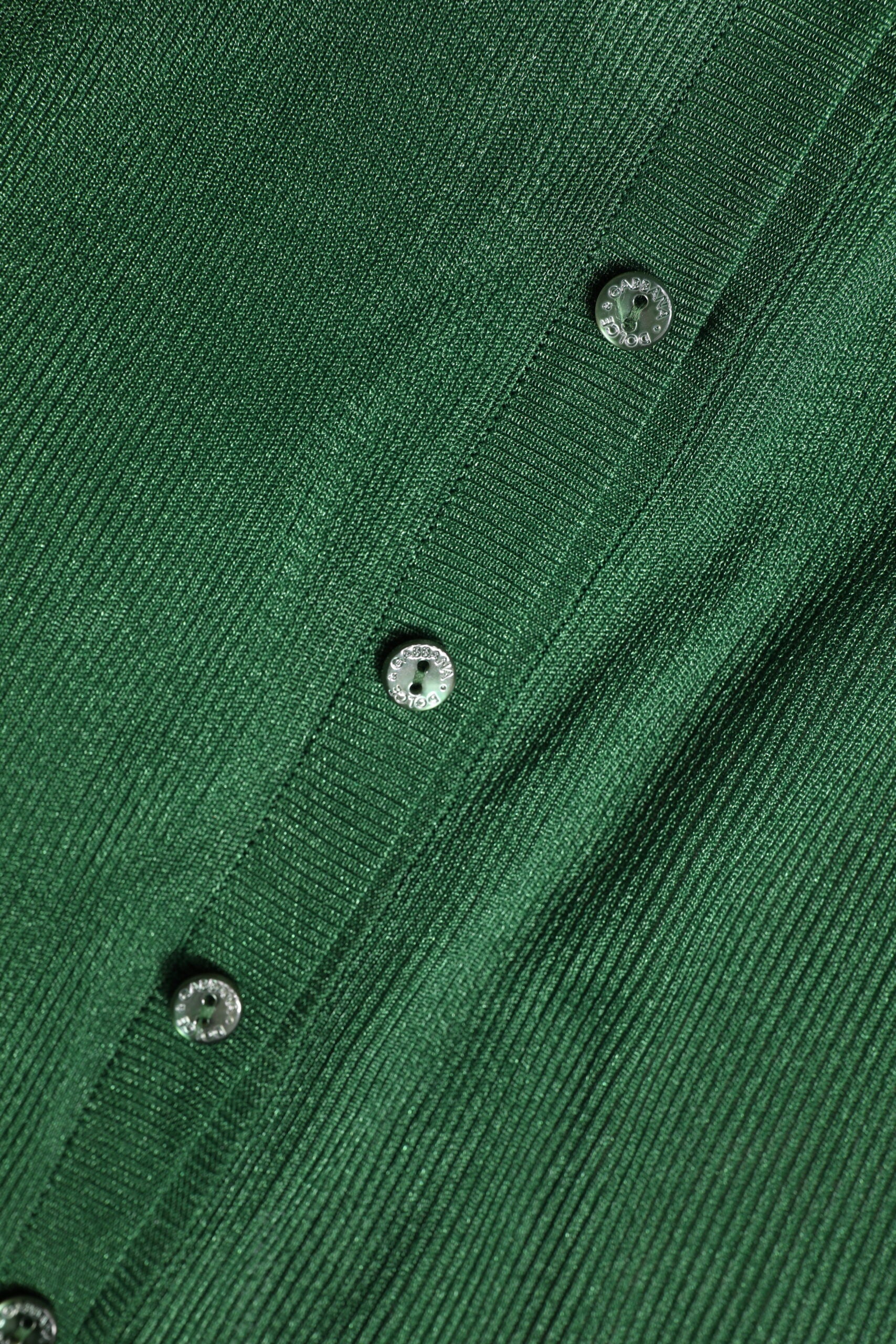Green fabric with shiny silver sequins