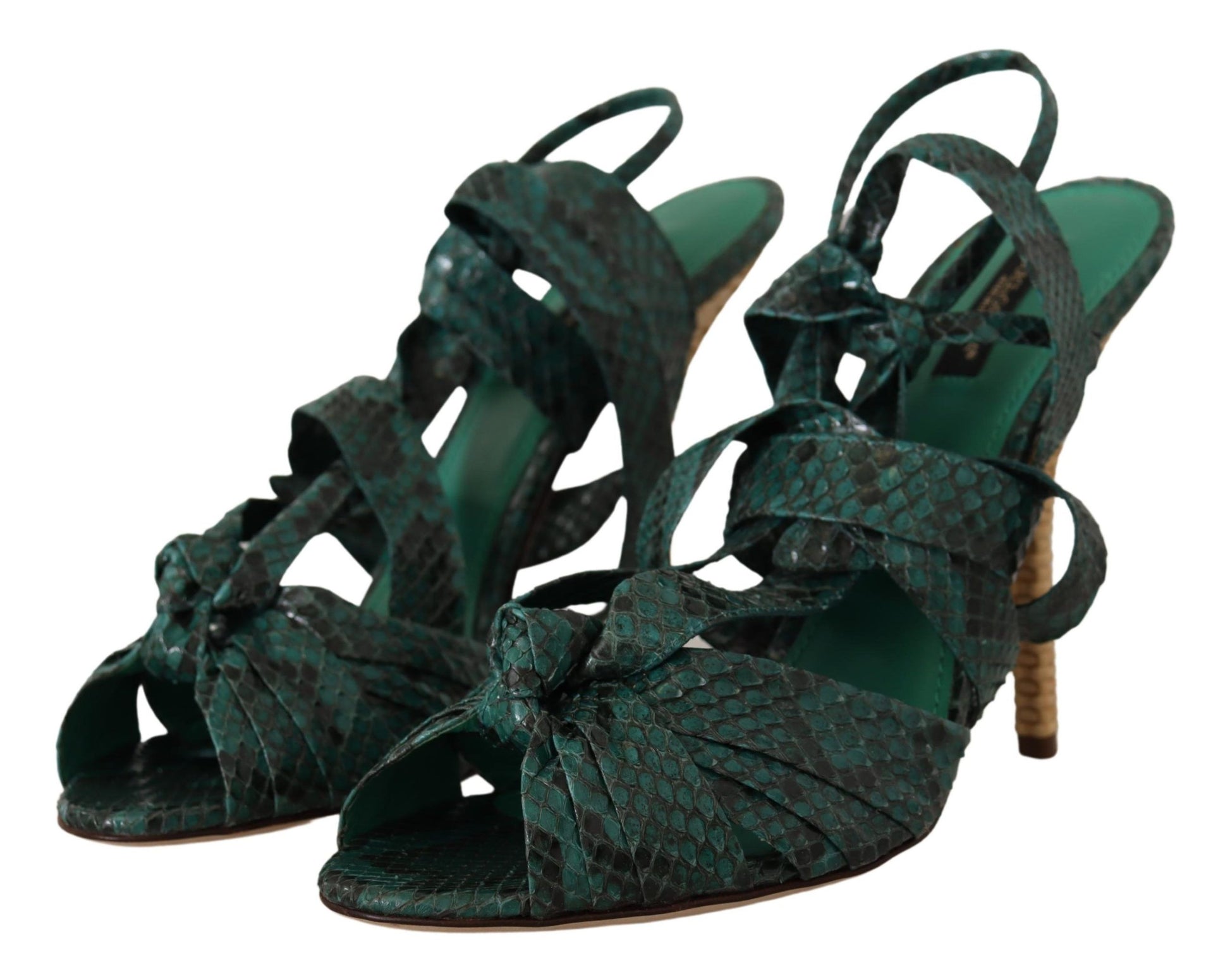Pair of green high heel sandals with straps and bow detail