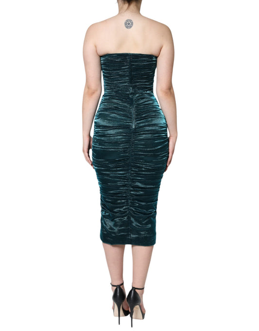 A fitted strapless dress in a green silk blend with satin detailing