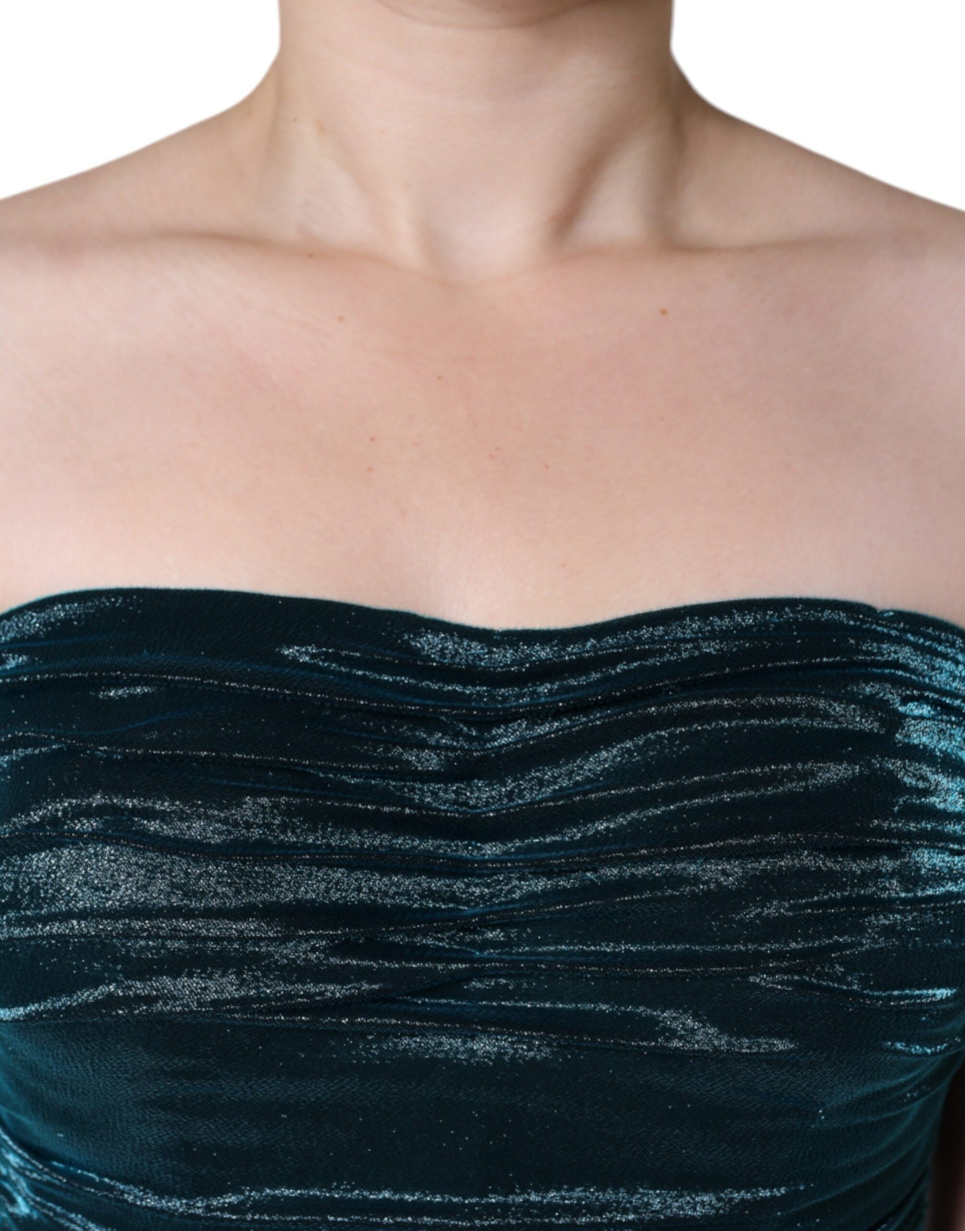 A fitted strapless dress in a green silk blend with a satin finish