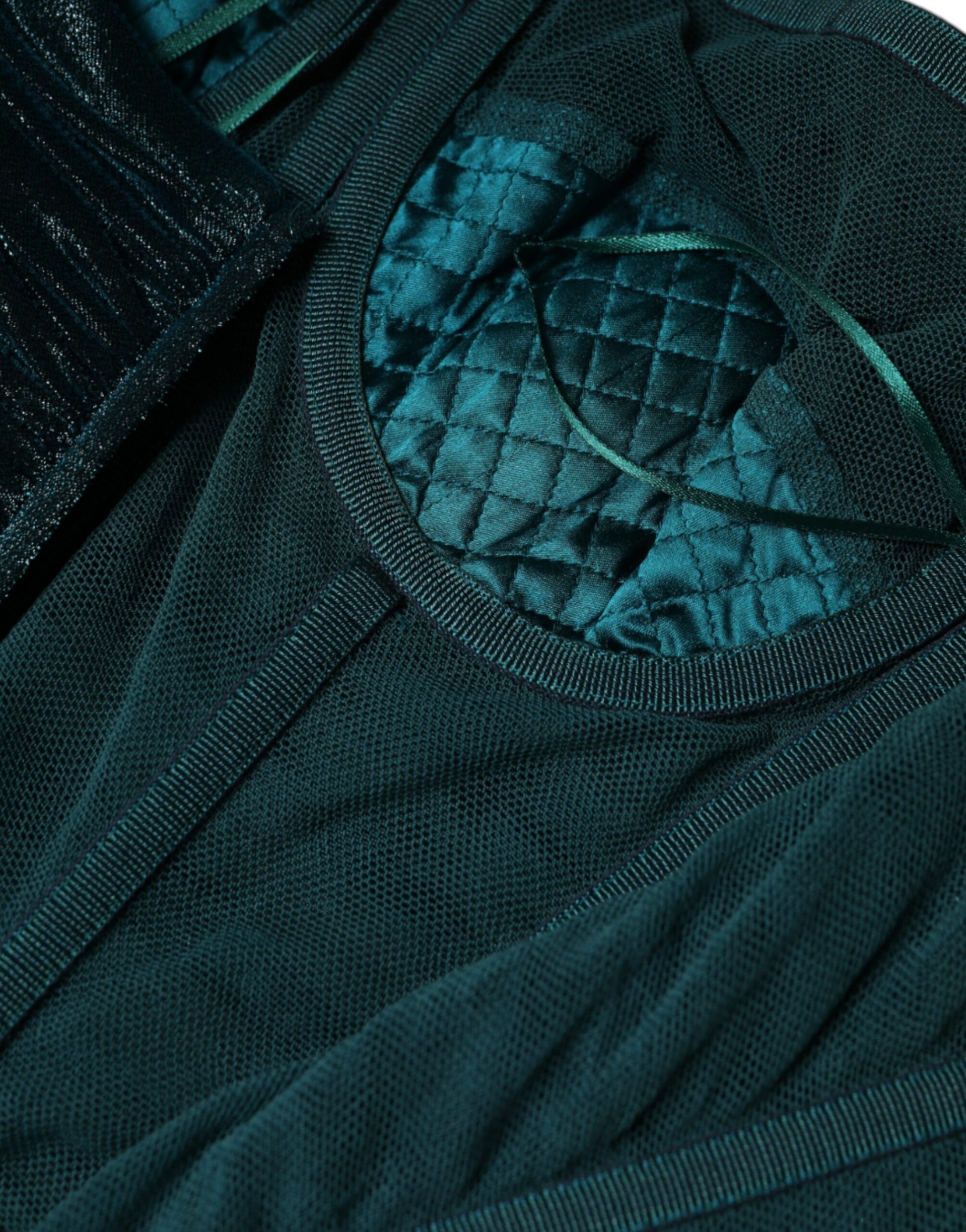 A green silk blend satin fitted strapless dress with a quilted design on the chest