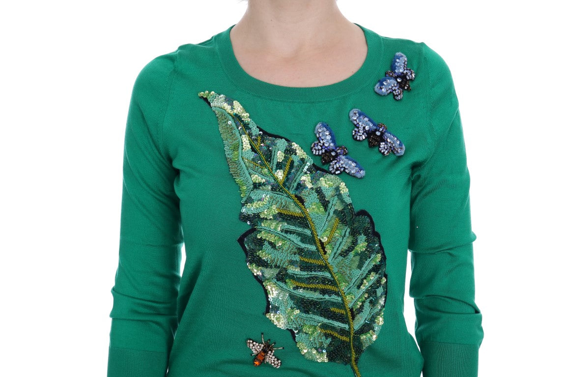 Green sweater with butterflies on a leaf design