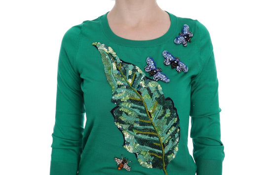 Green sweater with butterflies on a leaf design