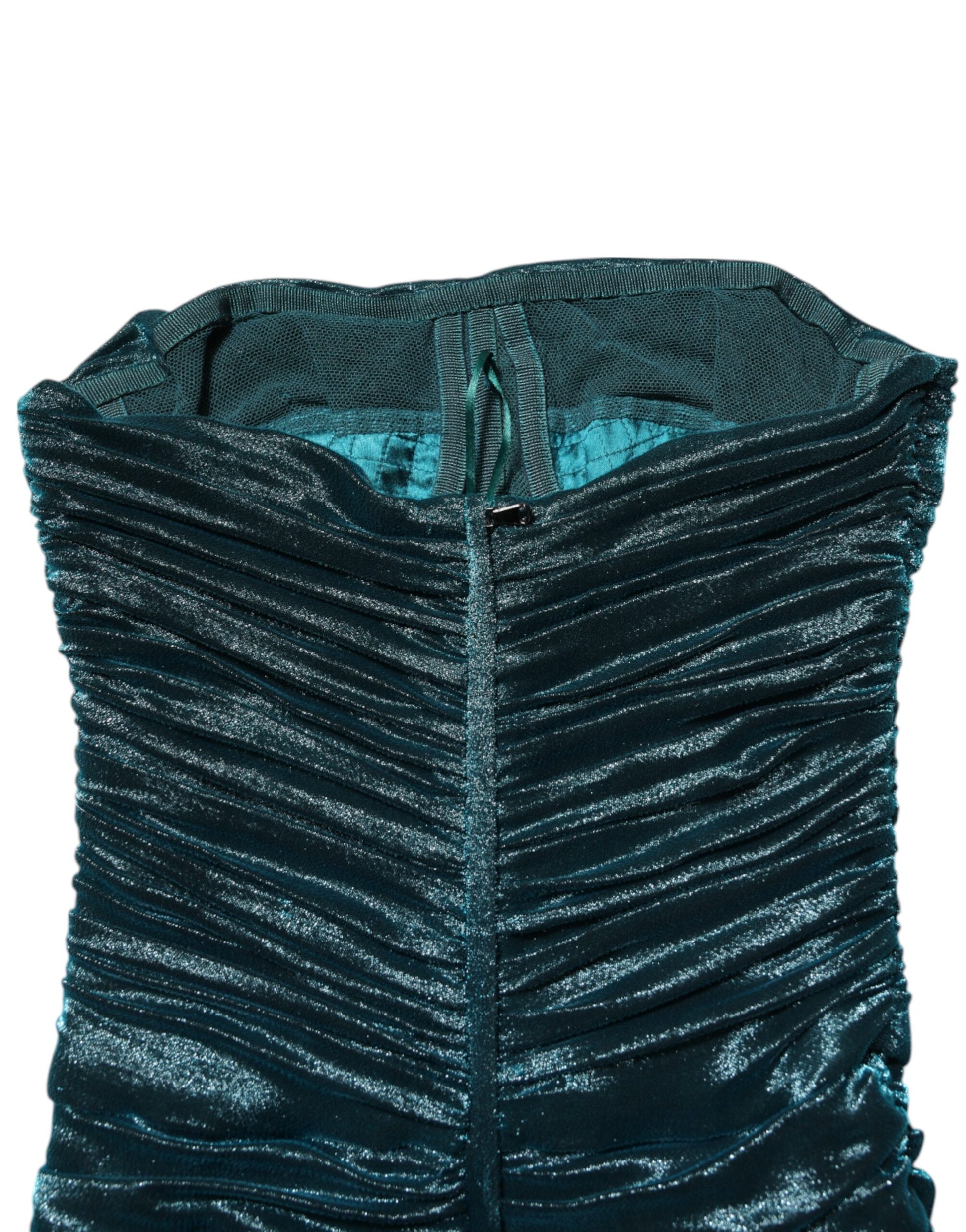 A fitted strapless dress in green silk satin with a textured bodice