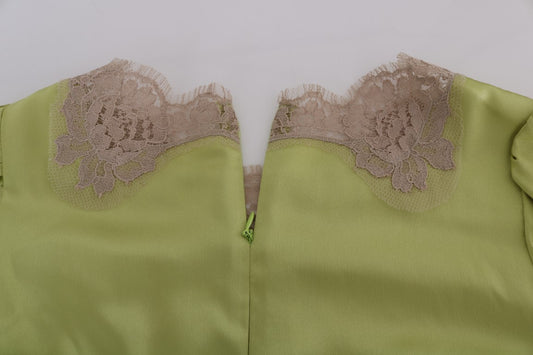 Green satin dress with lace trim