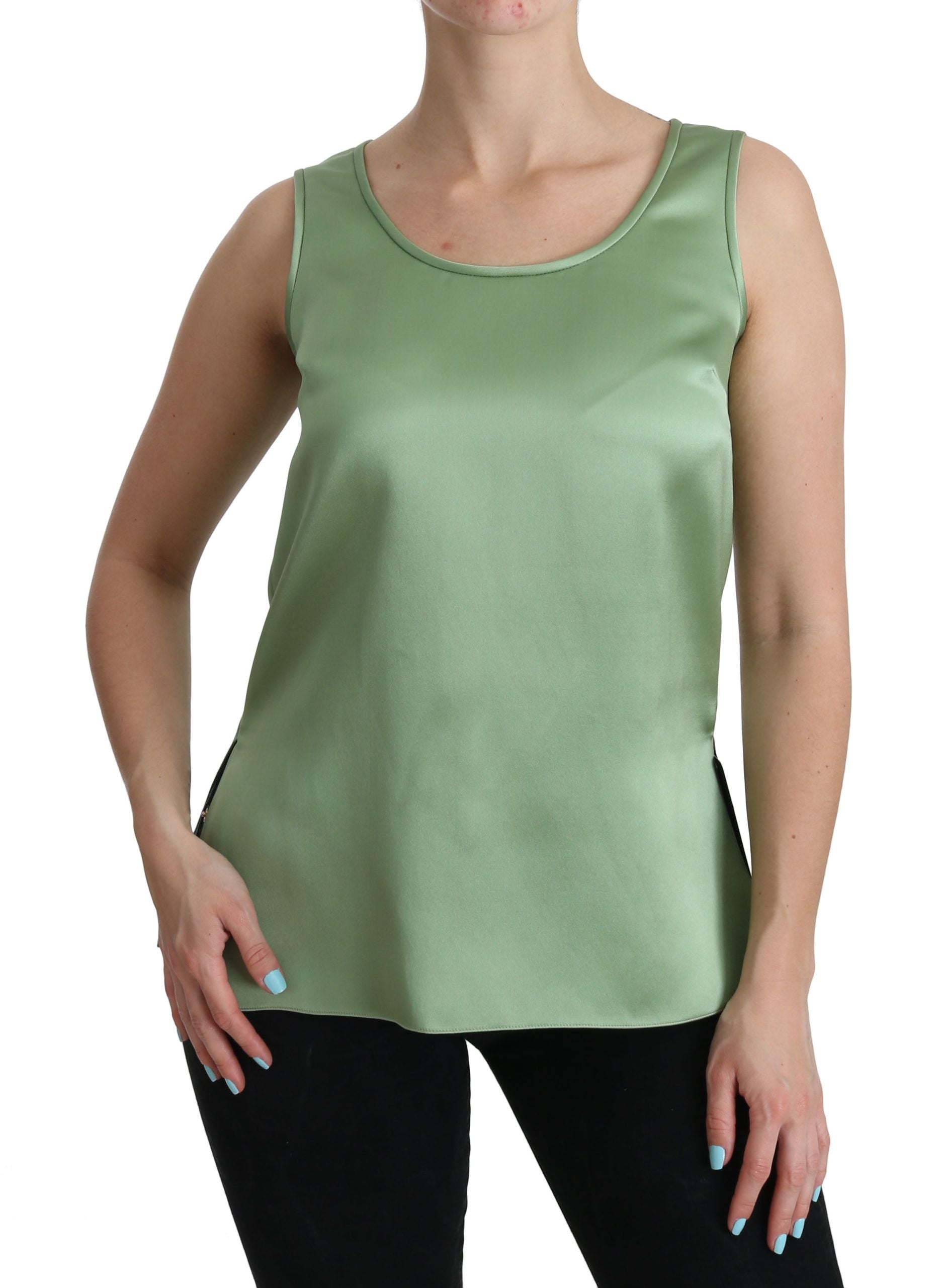 Green sleeveless top on woman