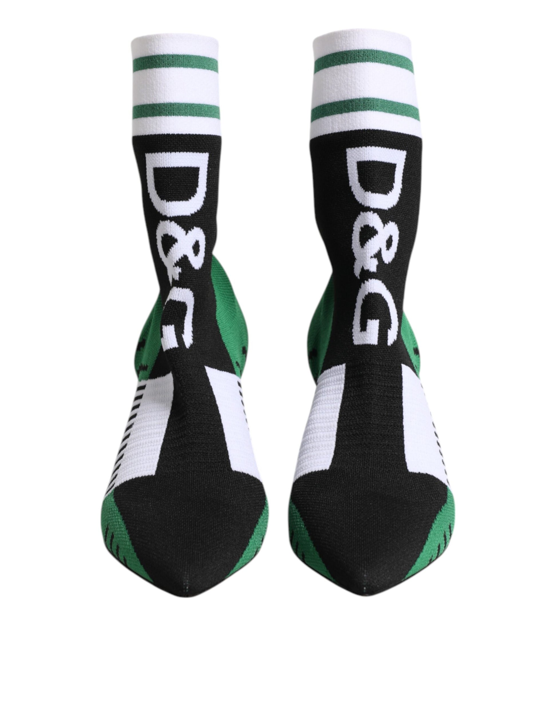 Pair of black socks with green stripes and white lettering