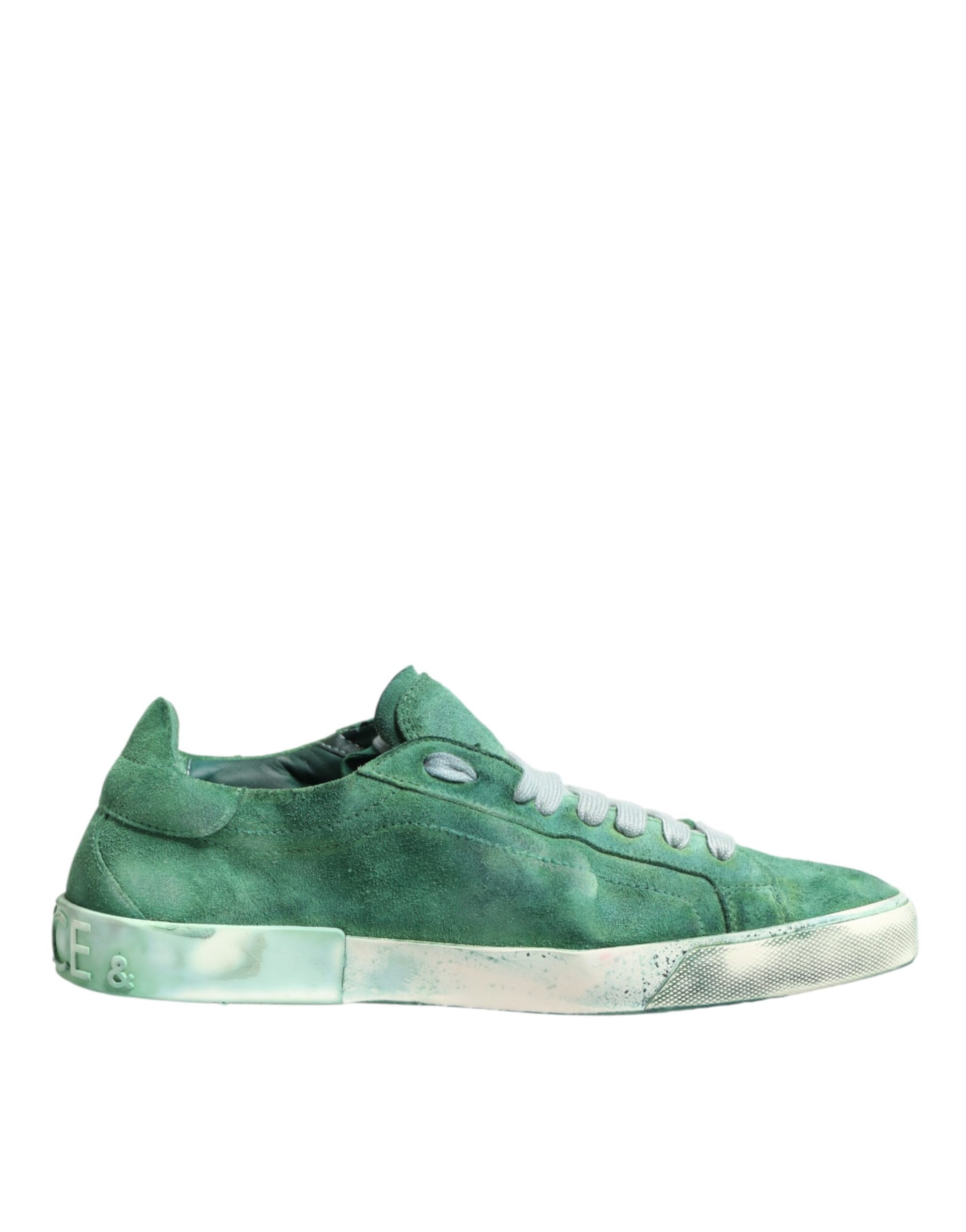 Green sneaker with white sole