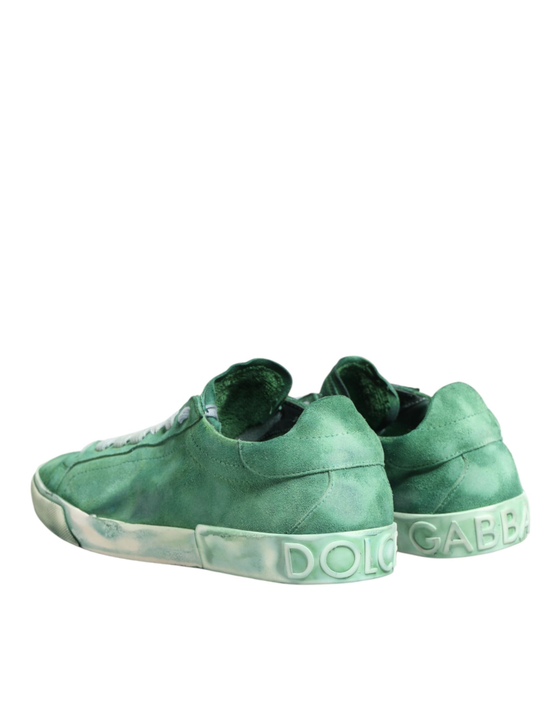 Green sneakers with white soles