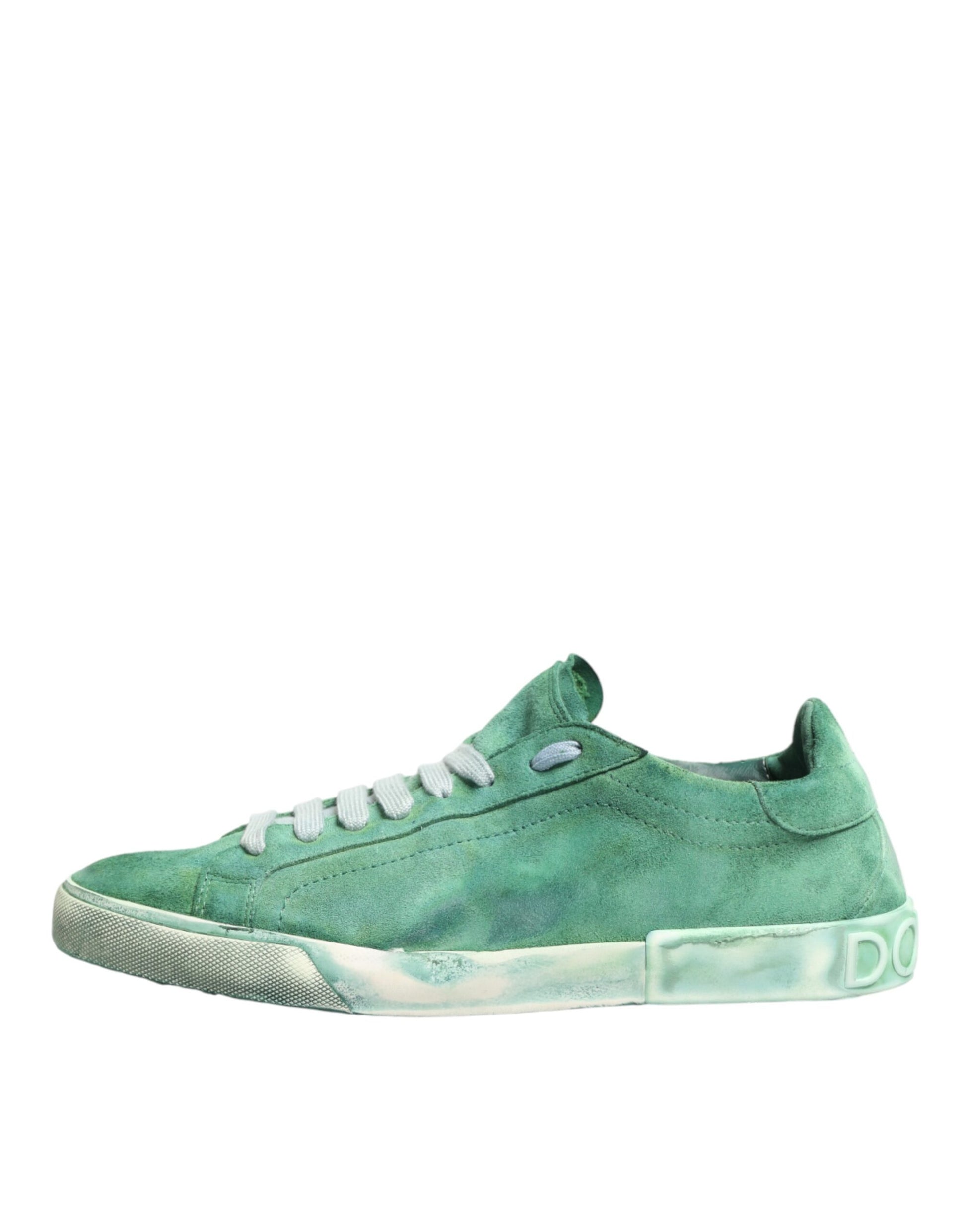 Green sneaker with white laces