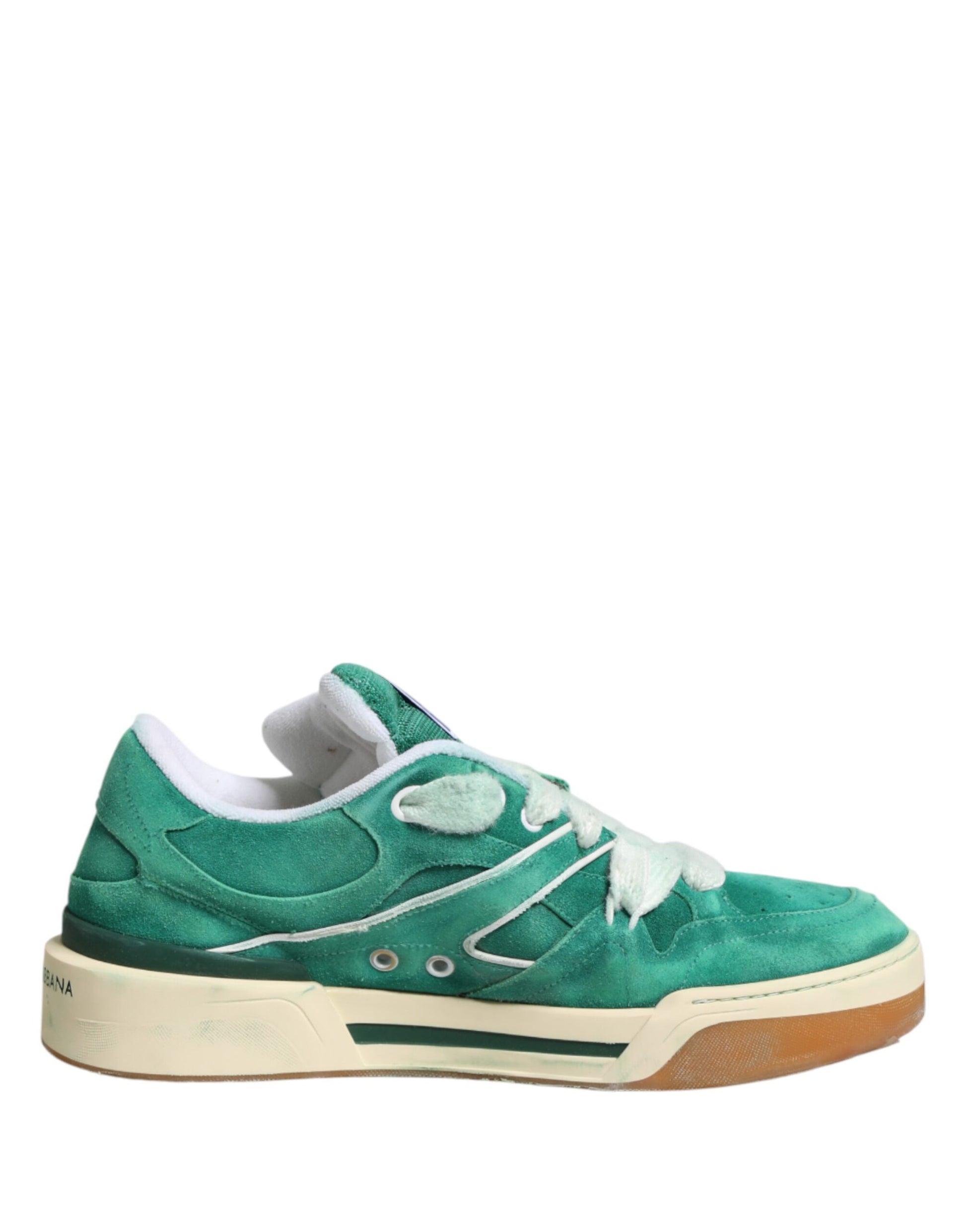 Green sneaker with white sole