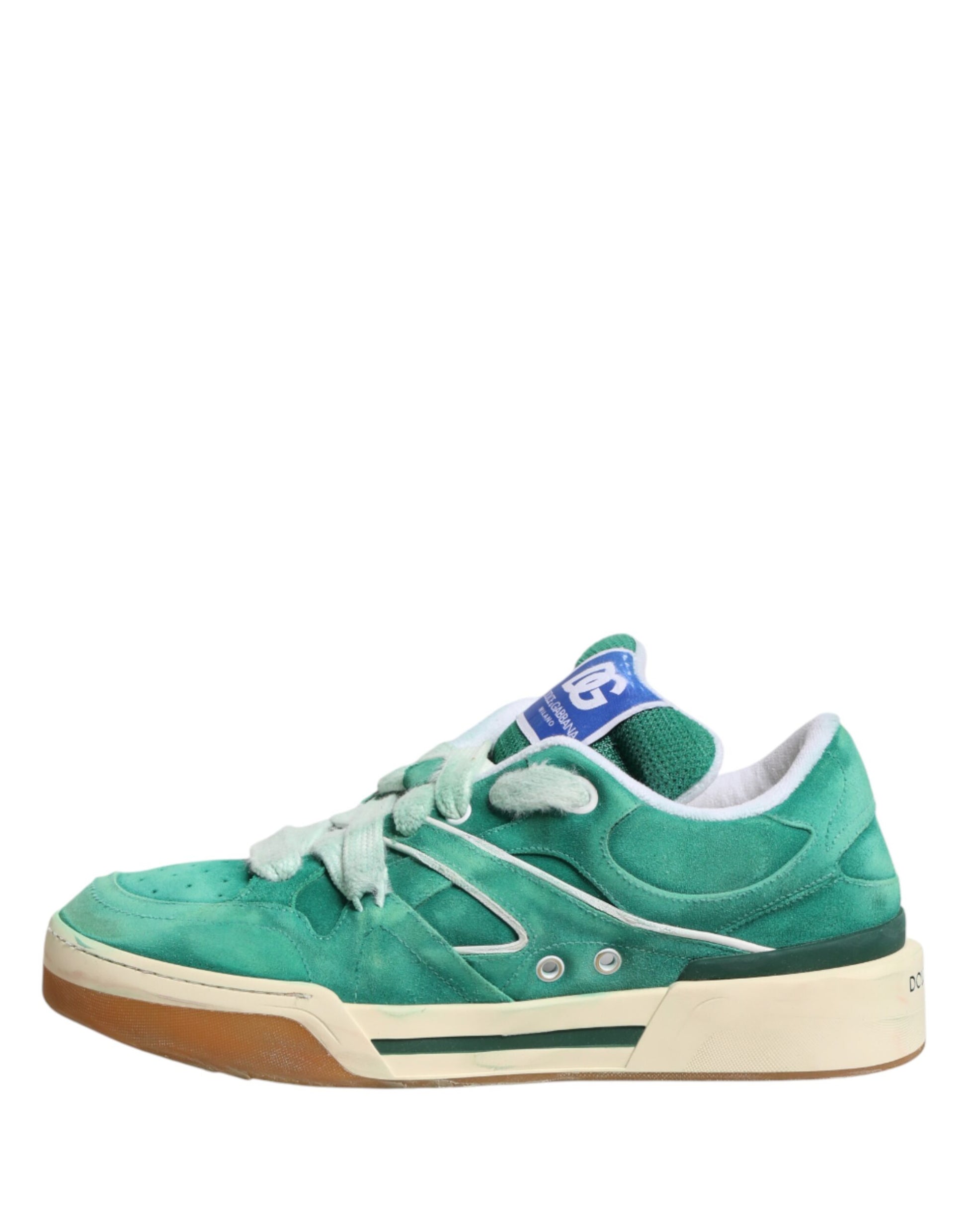 Green sneaker with white sole