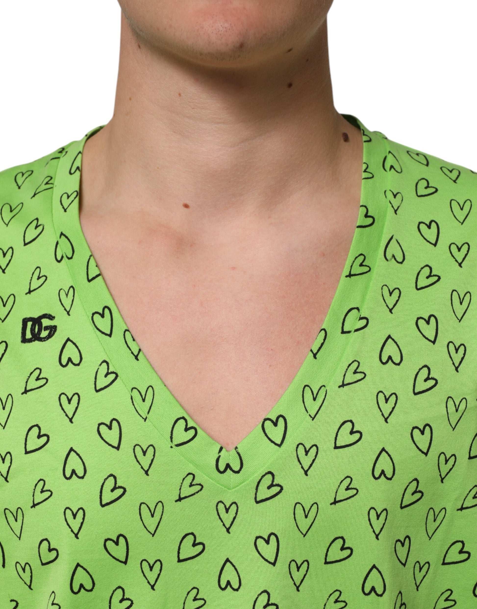 Green v-neck shirt with hearts pattern
