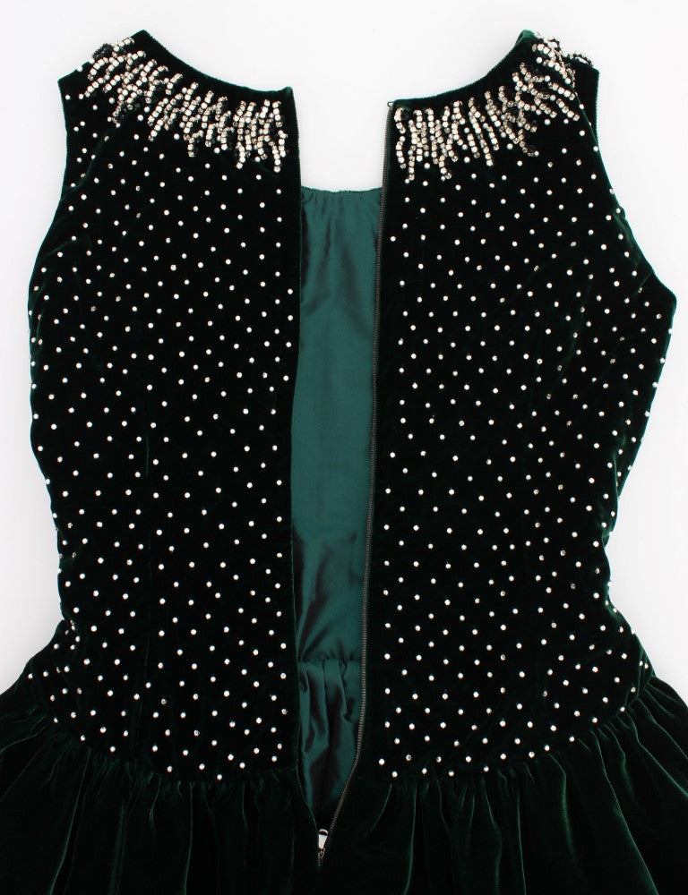 Black dress with green lining and polka dots on bodice