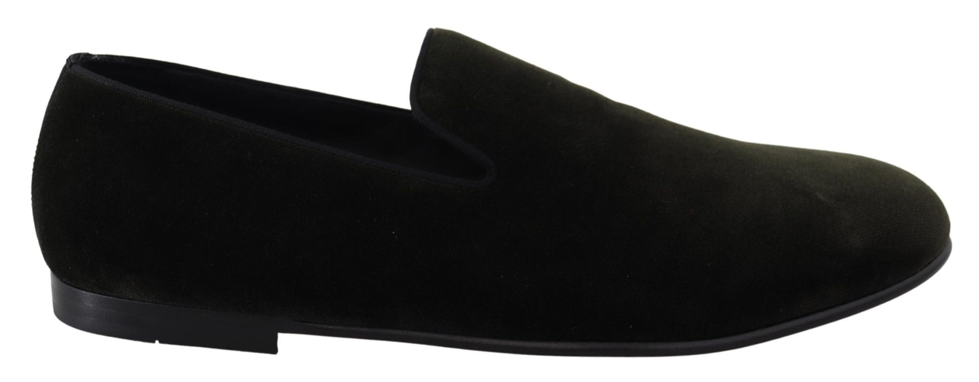 Pair of black loafers with a pointed toe and elastic panels on sides