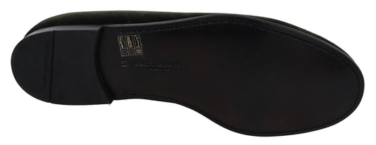 Black shoe with a logo on it