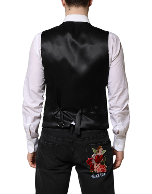 A black vest with a rose embroidered on the back