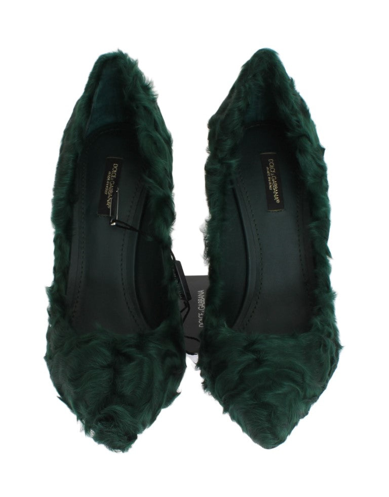 Pair of velvet shoes with fur trim and a bow on top