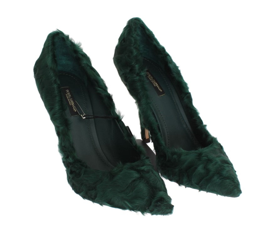 Pair of green velvet shoes with fur trim and gold accents