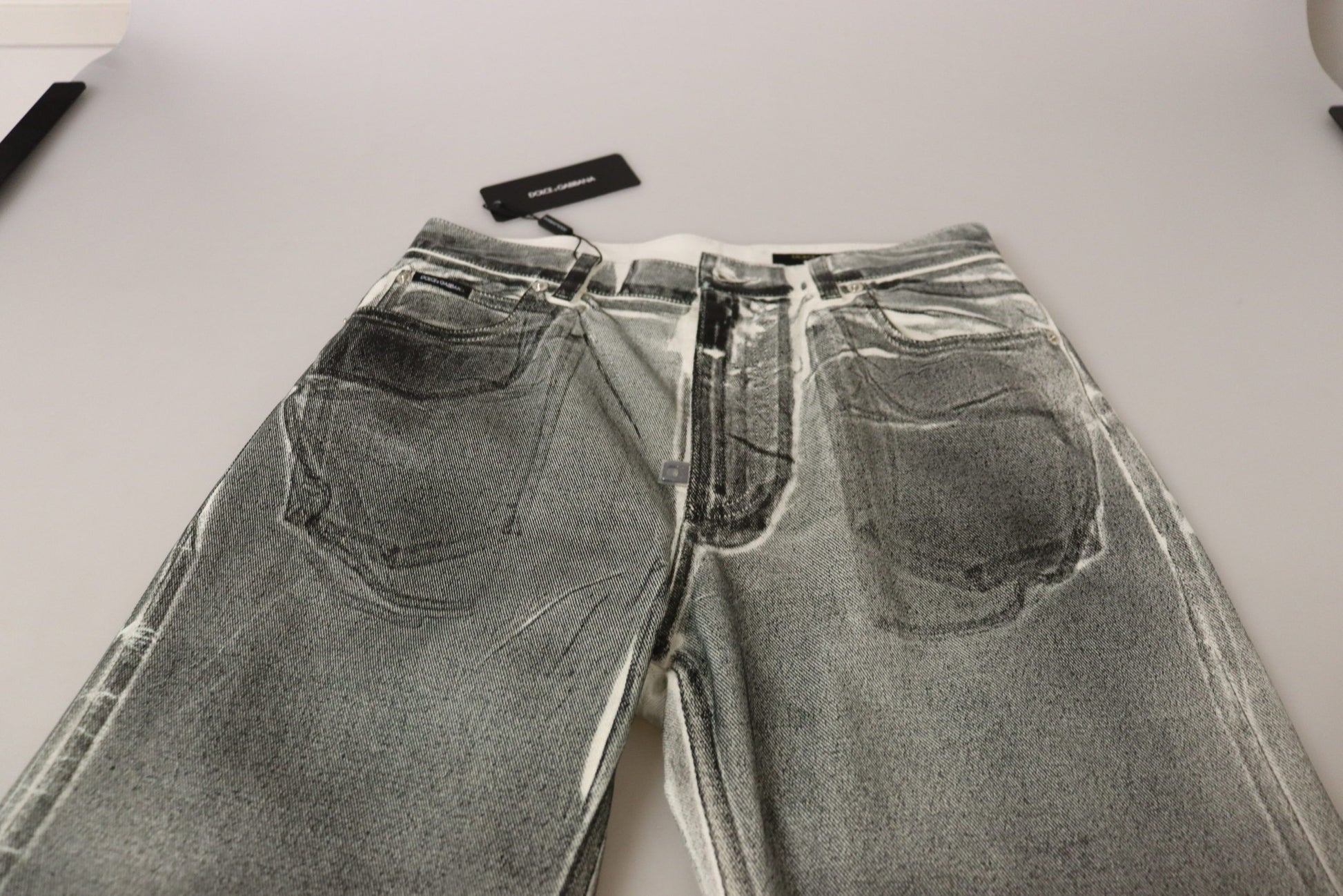 Pair of distressed jeans on display
