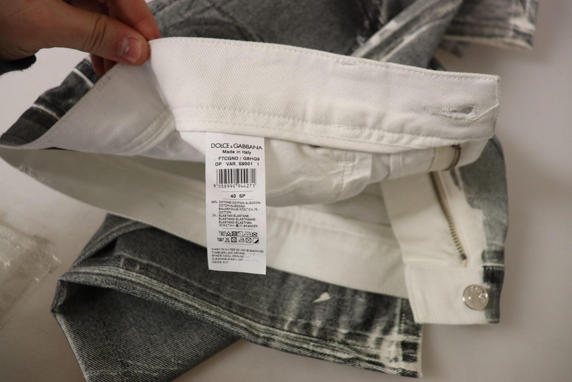 White tag on shirt sleeve