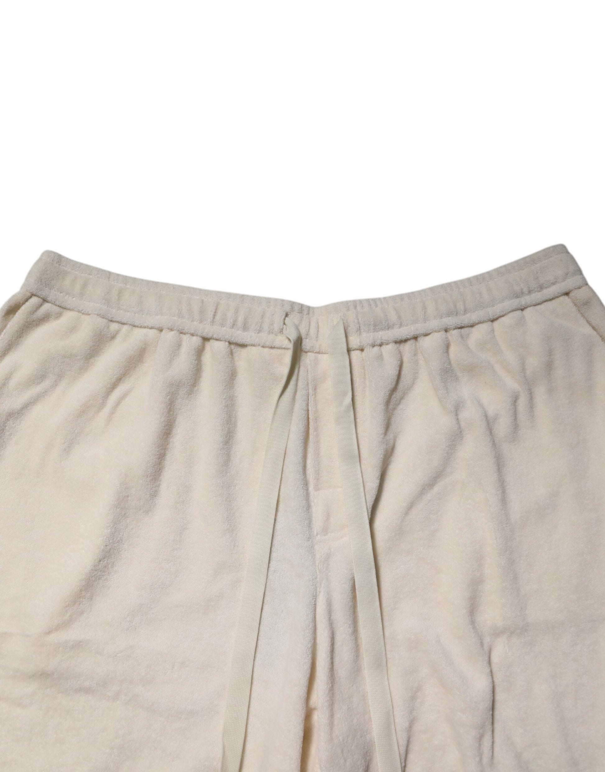 Pair of beige pants with elastic waistband