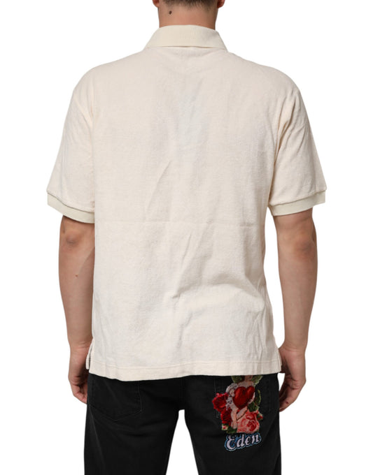 Man wearing a beige shirt and dark pants