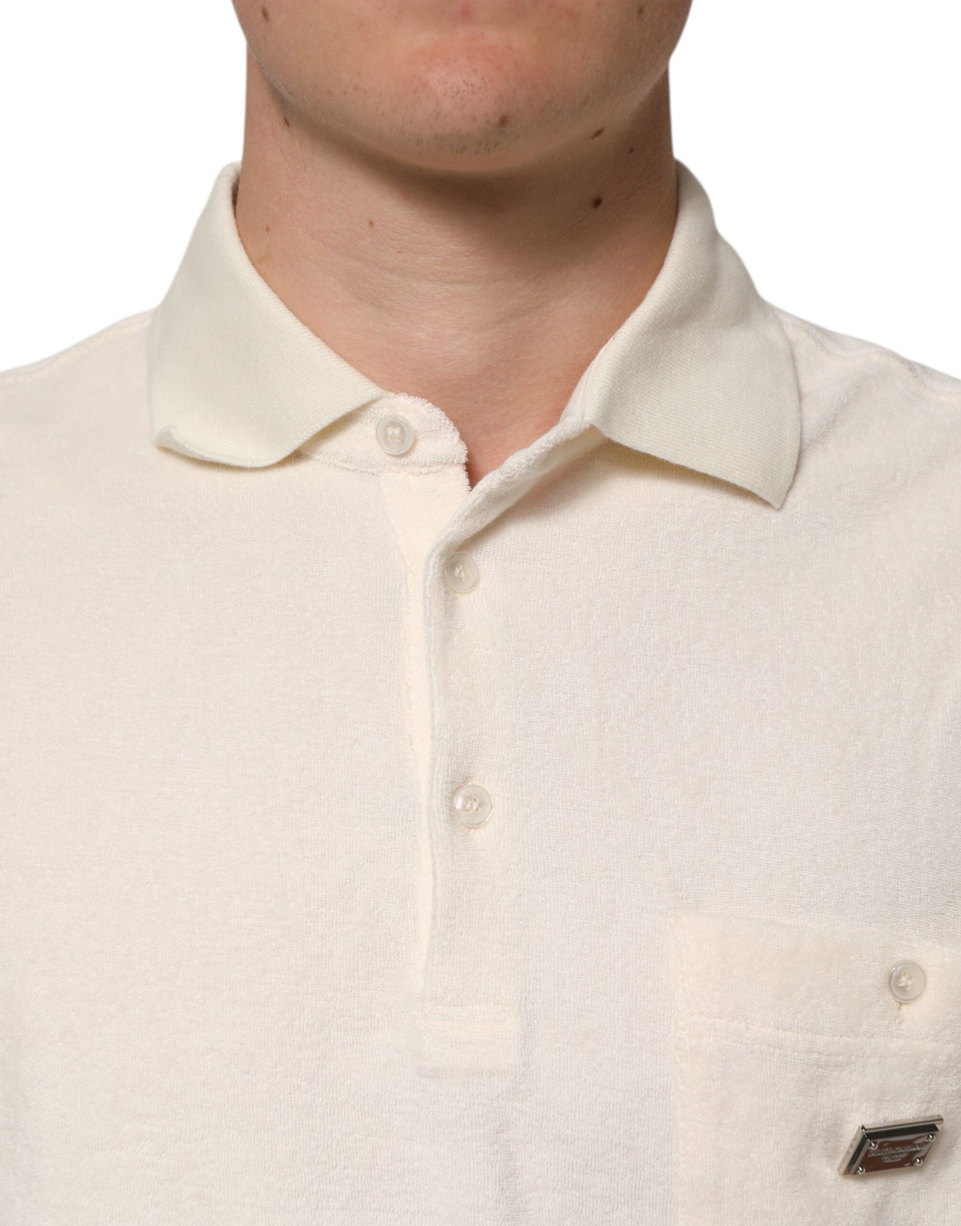 Man wearing a white polo shirt